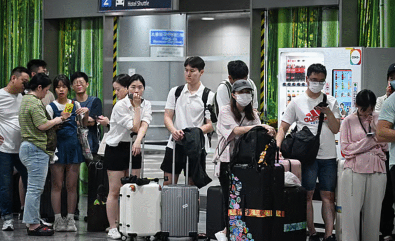 Emirates Flight EK382 Delayed by Typhoon Wipha in Hong Kong